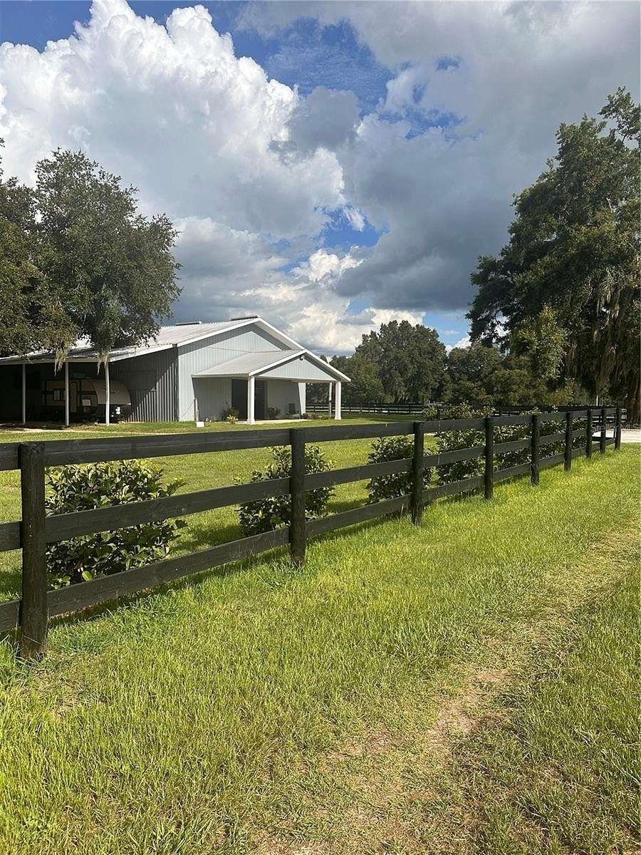 12.97 Acres of Land with Home for Sale in Summerfield, Florida