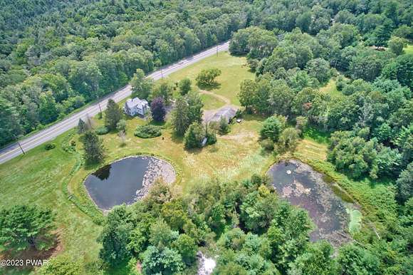 12.6 Acres of Land with Home for Sale in Dingmans Ferry, Pennsylvania
