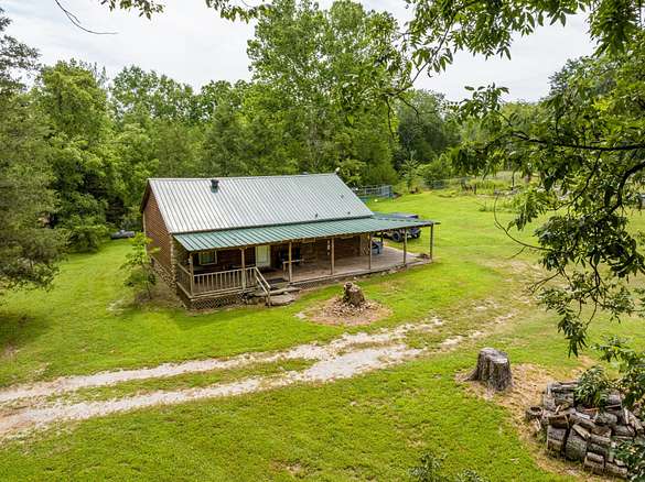 32 Acres of Recreational Land with Home for Sale in Melbourne, Arkansas