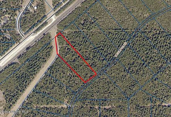 5.9 Acres of Residential Land with Home for Sale in Rathdrum, Idaho