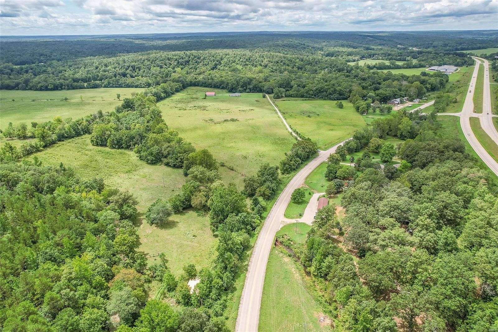 113 Acres of Agricultural Land with Home for Sale in Poplar Bluff