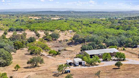 168 Acres of Land with Home for Sale in Round Mountain, Texas