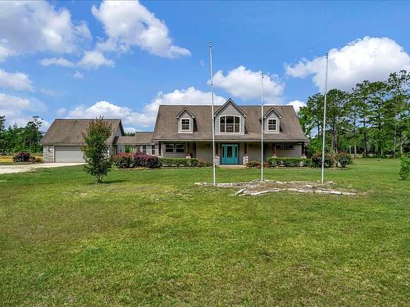 12.9 Acres of Land with Home for Sale in Silsbee, Texas