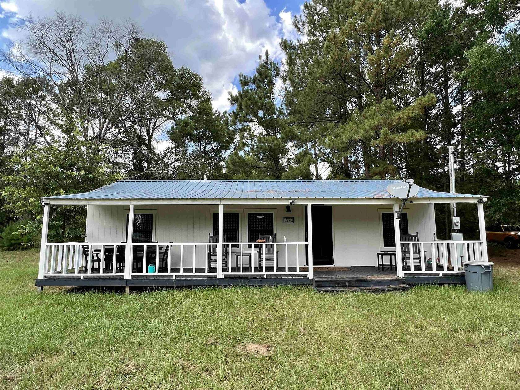 121 Acres of Recreational Land with Home for Sale in Marietta, Texas