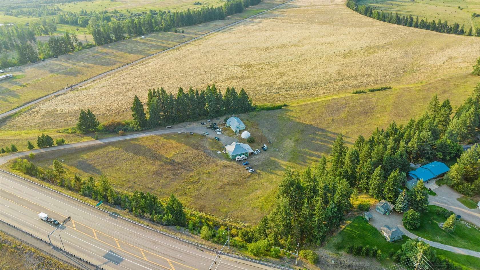 12.4 Acres of Land with Home for Sale in Columbia Falls, Montana