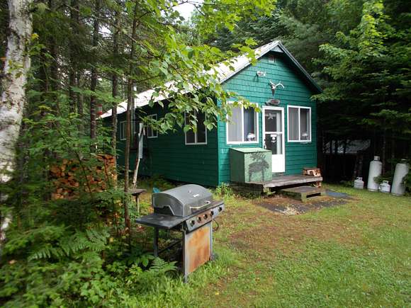 28 Acres of Recreational Land with Home for Sale in Tomhegan Township, Maine