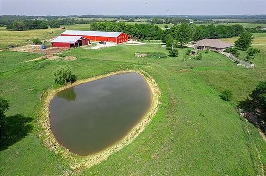 80 Acres of Agricultural Land with Home for Sale in Warrensburg, Missouri