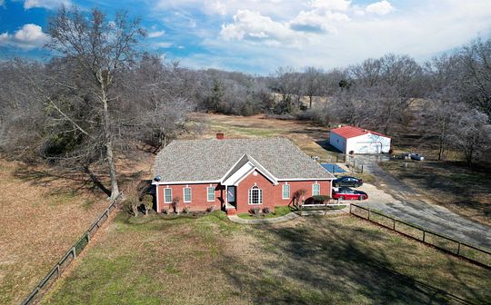 25.5 Acres of Land with Home for Sale in Gadsden, Tennessee