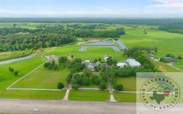 53.9 Acres of Agricultural Land with Home for Sale in Mount Pleasant, Texas