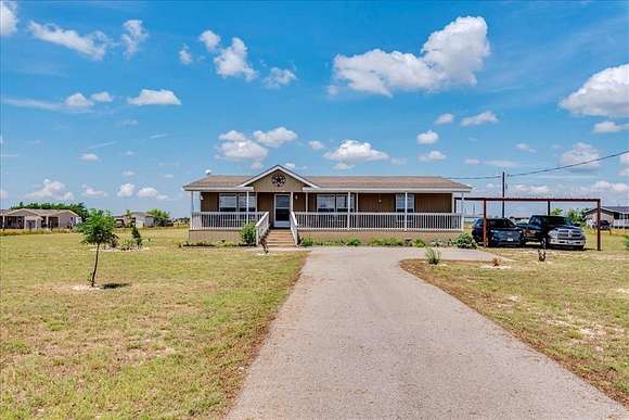 2.9 Acres of Residential Land with Home for Sale in Bertram, Texas