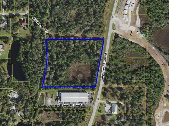 7.6 Acres of Commercial Land for Sale in Lake Suzy, Florida