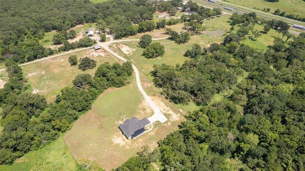 64.5 Acres of Agricultural Land with Home for Sale in Sulphur Springs, Texas