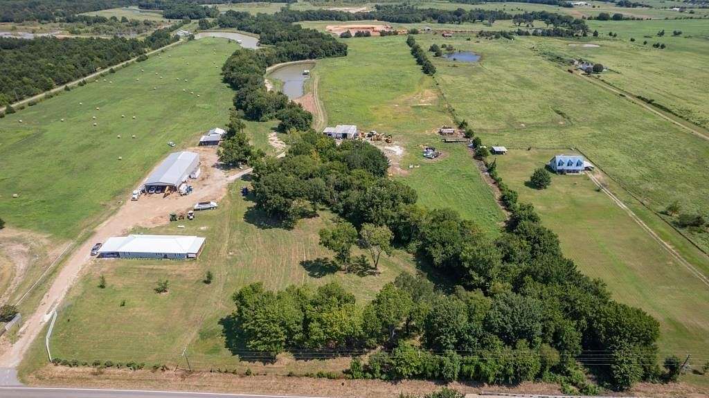 27.022 Acres of Recreational Land with Home for Sale in Bonham, Texas