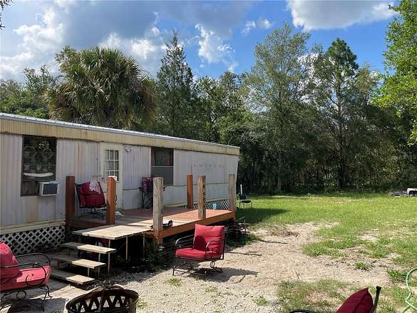 2.5 Acres of Residential Land with Home for Sale in Dunnellon, Florida