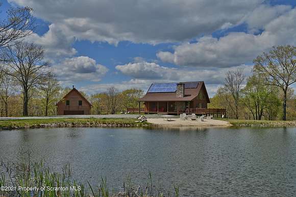 242 Acres of Recreational Land with Home for Sale in Roaring Brook Township, Pennsylvania