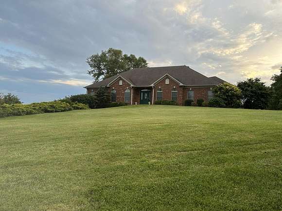 18.8 Acres of Land with Home for Sale in Versailles, Kentucky