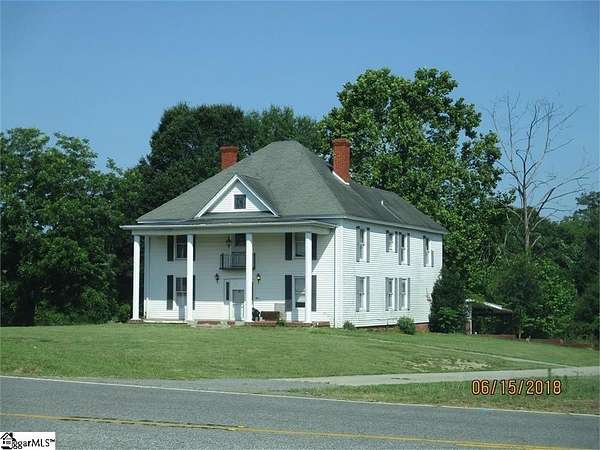 3.78 Acres of Land with Home for Sale in Greer, South Carolina