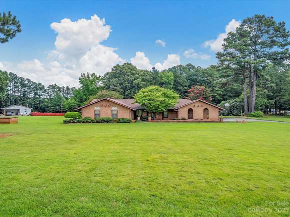 3.1 Acres of Residential Land with Home for Sale in Matthews, North Carolina