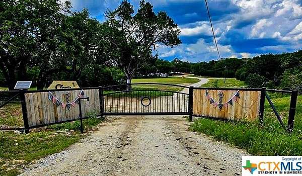 32.4 Acres of Agricultural Land with Home for Sale in Canyon Lake, Texas