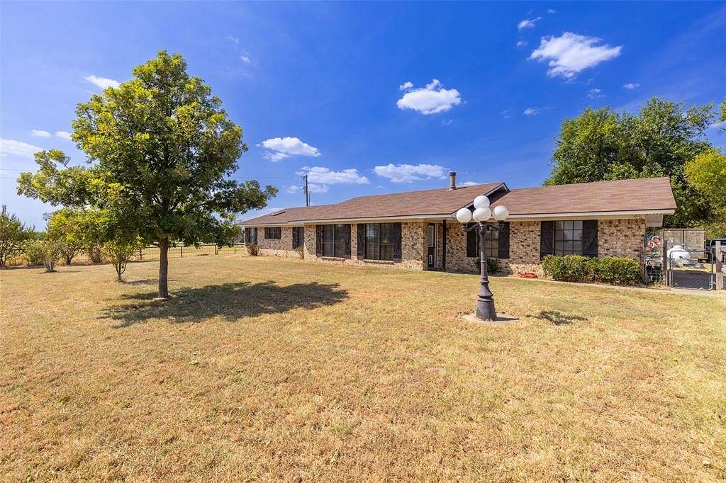 49.4 Acres of Agricultural Land with Home for Sale in Brashear, Texas