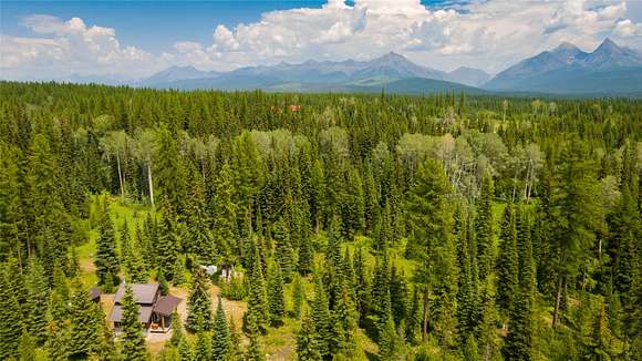 24.1 Acres of Recreational Land with Home for Sale in Polebridge, Montana