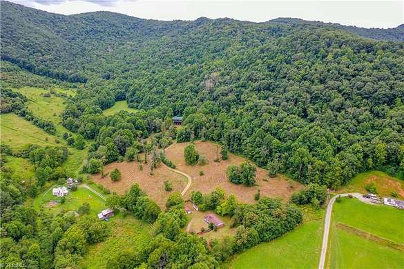81.6 Acres of Recreational Land with Home for Sale in Sparta, North Carolina