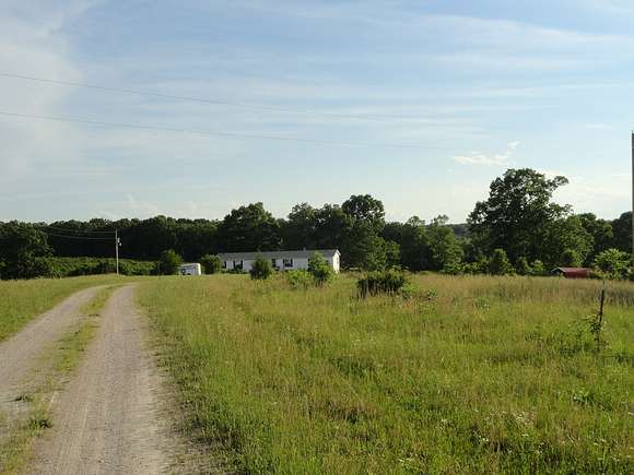 120 Acres of Land with Home for Sale in Macks Creek, Missouri