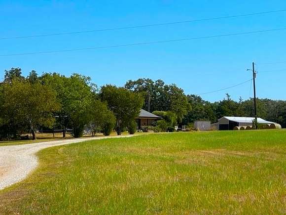 27.7 Acres of Agricultural Land with Home for Sale in Bowie, Texas