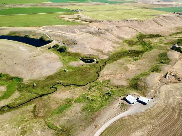 224 Acres of Land with Home for Sale in Fort Shaw, Montana