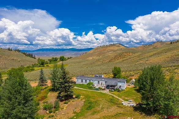 160 Acres of Land with Home for Sale in Sargents, Colorado