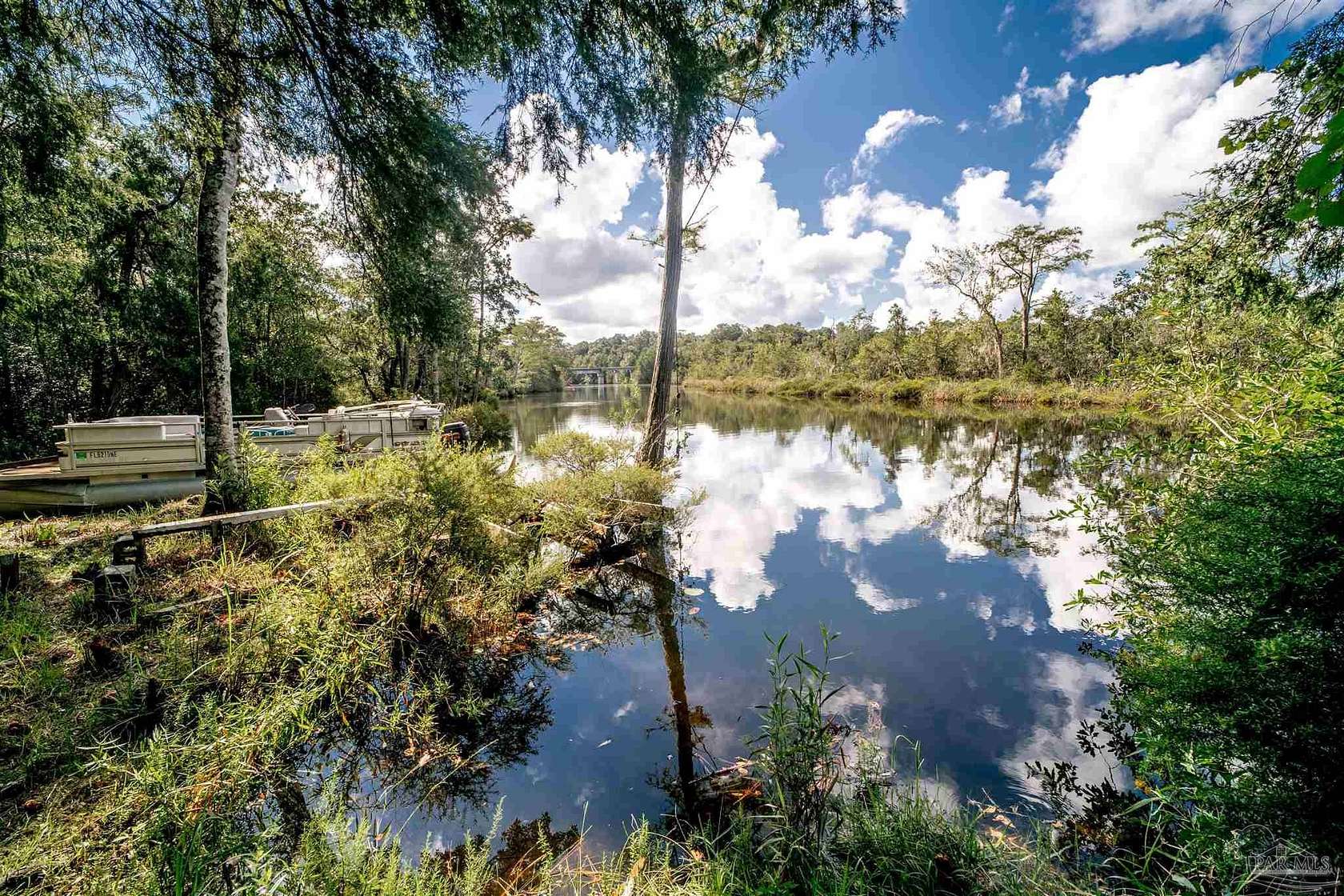 4.7 Acres of Residential Land with Home for Sale in Milton, Florida
