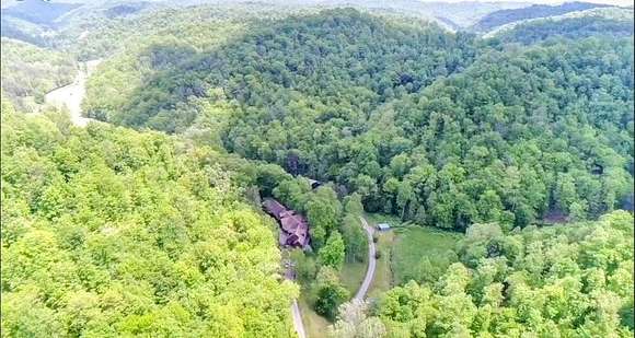 145 Acres of Land with Home for Sale in Oil Springs, Kentucky