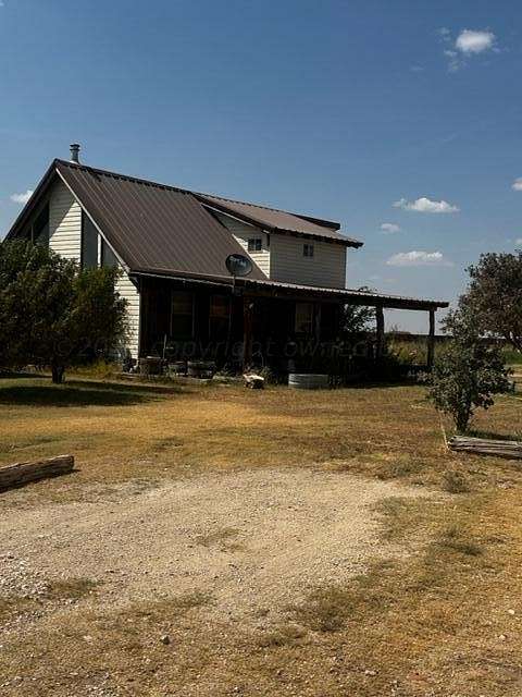 4 Acres of Residential Land with Home for Sale in Canyon, Texas