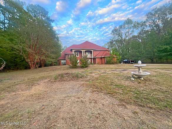 2.5 Acres of Residential Land with Home for Sale in Raymond, Mississippi