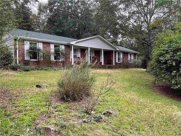 16 Acres of Land with Home for Sale in Lithonia, Georgia