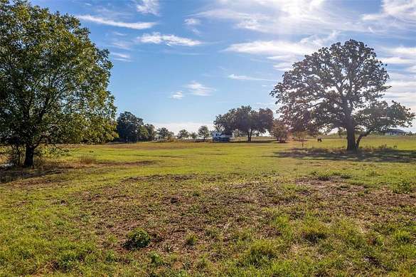 12.38 Acres of Land for Sale in Covington, Texas