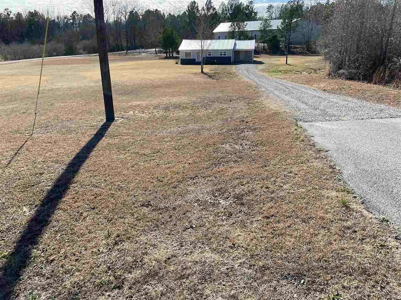2.1 Acres of Residential Land with Home for Sale in Henderson, Tennessee