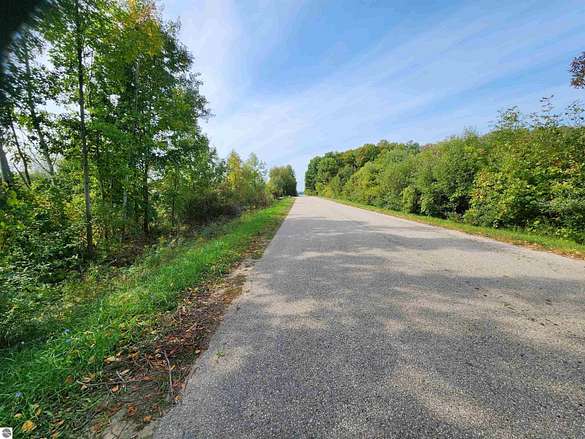 3.4 Acres of Land for Sale in Kewadin, Michigan