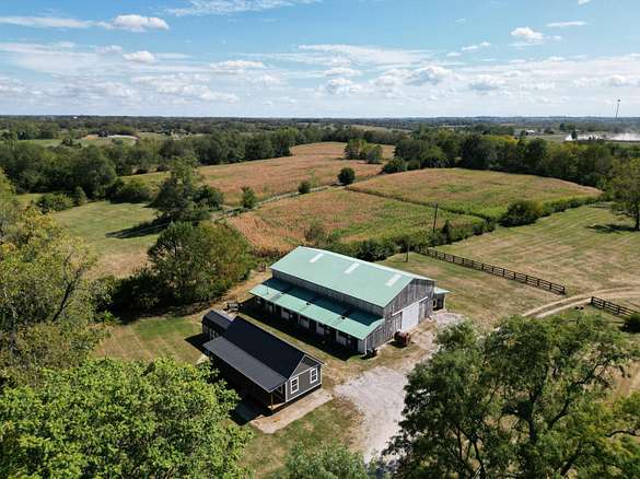 128 Acres of Land with Home for Sale in Versailles, Kentucky