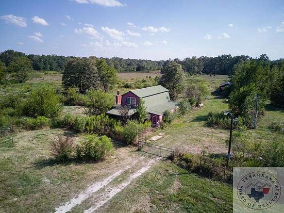 78.4 Acres of Land with Home for Sale in De Kalb, Texas