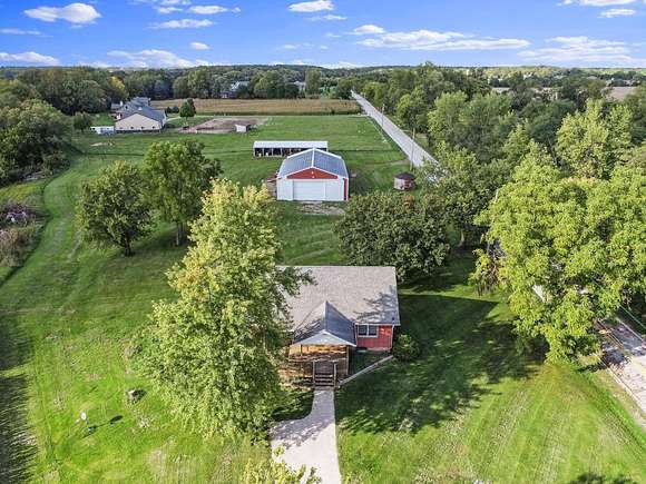 56 Acres of Agricultural Land with Home for Sale in Lowell, Indiana
