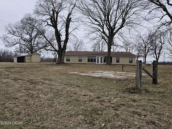 5 Acres of Land with Home for Sale in Goodman, Missouri