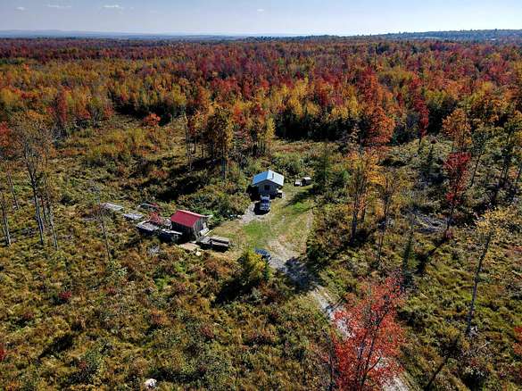 188 Acres of Agricultural Land with Home for Sale in Pittsfield, Maine