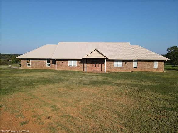 129 Acres of Recreational Land with Home for Sale in Cameron, Oklahoma