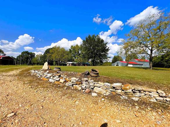68.9 Acres of Agricultural Land with Home for Sale in Mammoth Spring, Arkansas