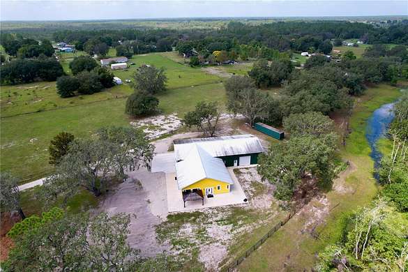 14.1 Acres of Land with Home for Sale in Polk City, Florida