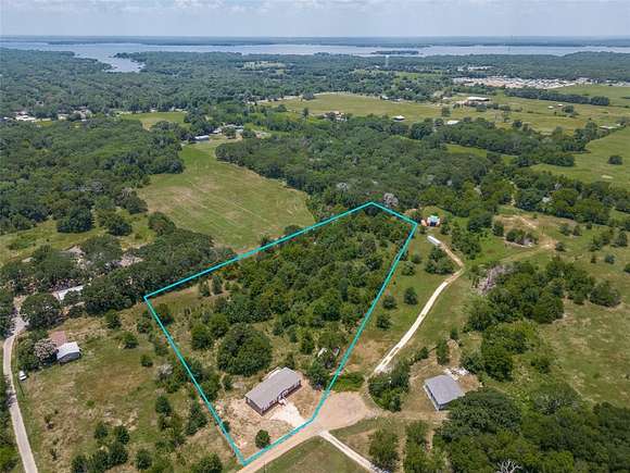 4.663 Acres of Residential Land with Home for Sale in Eustace, Texas