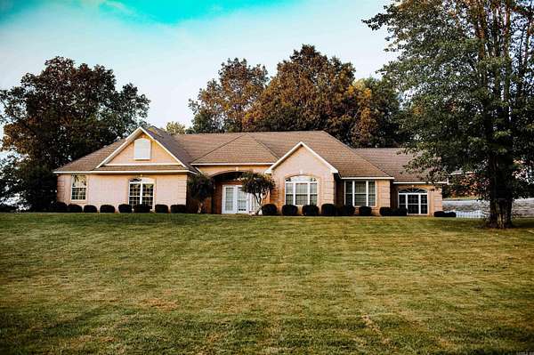 2.28 Acres of Residential Land with Home for Sale in Piggott, Arkansas