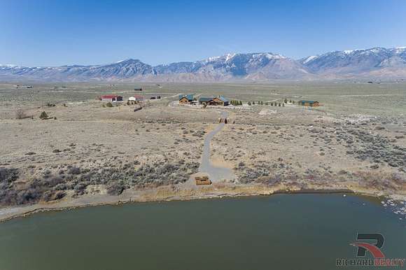 22.2 Acres of Land with Home for Sale in Powell, Wyoming