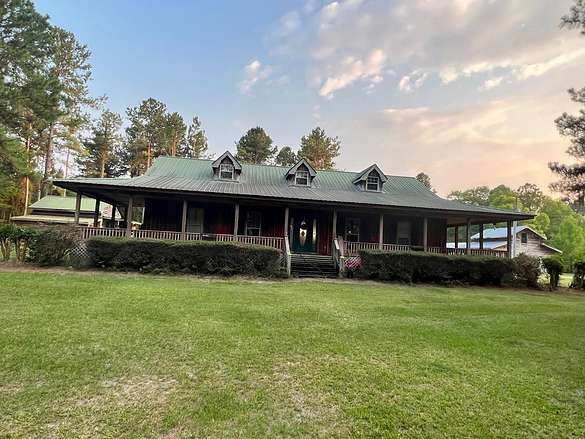 37.4 Acres of Land with Home for Sale in Alamo, Georgia